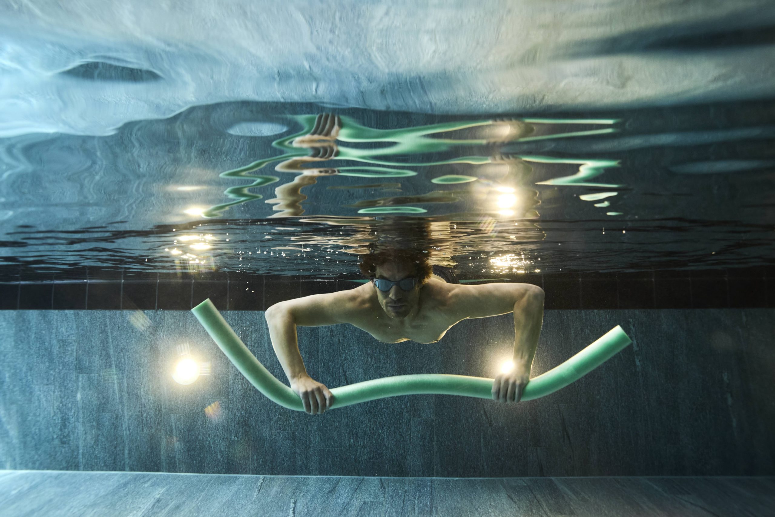 man swimming underwater